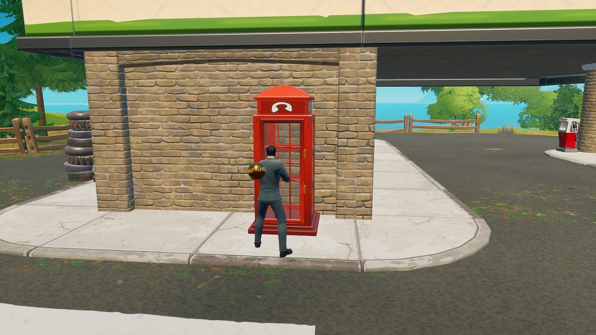fortnite superman challenge use a phone booth as clark kent millenium